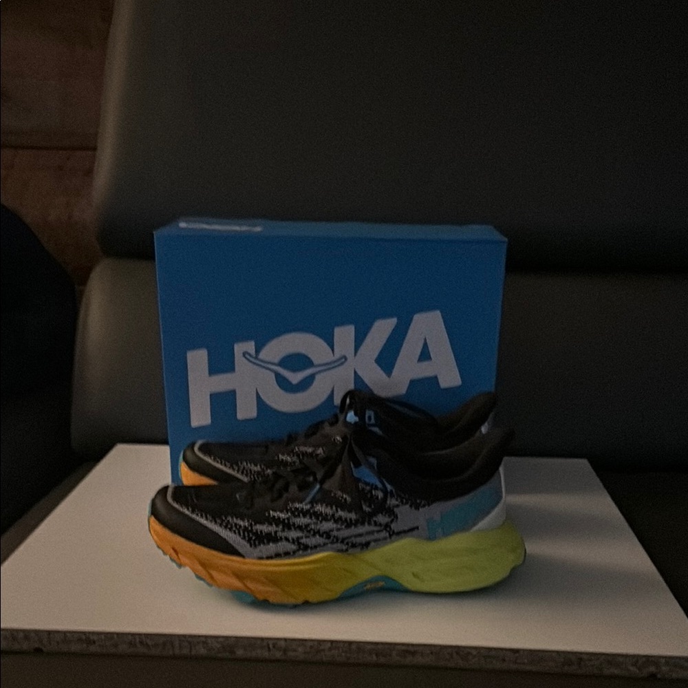 Hoka Black and Vibrant Athletic Sneakers